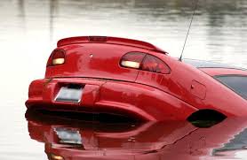 car sinking in high water car is