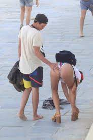 jackie cruz in a colorful swimsuit hanging out the beach in barcelona  spain-280717_21