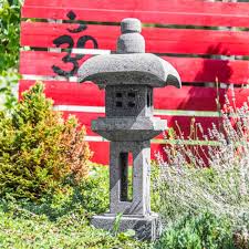 This small curved concrete japanese garden lantern pagoda is a 2 piece hand cast japanese lamp that draws a focal point in all types of gardens and landscape environments. Lava Stone Garden Lamp Natural H 70 Cm