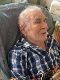 My Dad is in the back row wearing the hat.