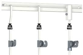 The picture rail hangs about a foot below the ceiling. Picture Rail Hangers