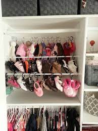 Baby Shoe And Hat Storage Using Cheap Curtain Tension Rods And Hangers So Much Better Kids Closet Organization Ikea Closet Organizer Baby Closet Organization