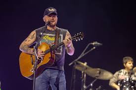 Zach Bryan song lyrics addressing ICE issues