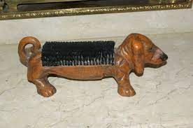 Check spelling or type a new query. Heavy Antique Cast Iron Boot Scraper With Brush Dachshund Sausage Dog Door Stop Dog Door Stop Sausage Dog Antique Cast Iron