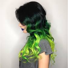 Black hair is the darkest and most common of all human hair colors globally, due to larger populations with this dominant trait. Dark To Neon Green The Colors On This Long Curly Hair Are Really Bold Green Hair Colored Hair Tips Ombre Hair Color