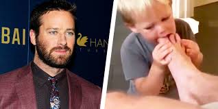 Armie hammer reunited with his two children in the cayman islands months after estranged wife elizabeth chambers filed for divorce from the call me by your name actor. Armie Hammer S Son Sucking His Dad S Toes Is Not That Weird
