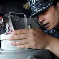 Airman Wesley Kinard, left, from Highland Park, Illinois,