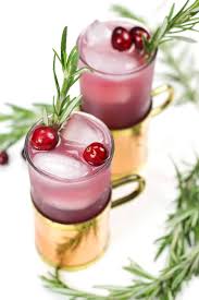 Based On The Traditional Moscow Mule The Yule Mule Is A Holiday Cocktail Featuring Ginger Beer And Cranberry Christmas Cocktails Mule Recipe Holiday Cocktails