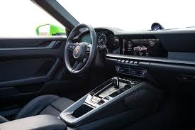 The buttons, which have been consciously kept as analogue buttons, offer direct access to essential drive and chassis functions. 2019 Porsche 911 992 Carrera S Cabriolet Free High Resolution Car Images