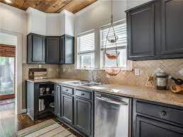 Maybe you would like to learn more about one of these? Love The Charcoal Grey Cabinets With Warm Beige Countertop And Backsplash Beige Kitchen Beige Kitchen Cabinets Grey Cabinets