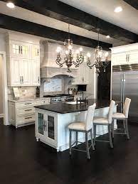 French Country Kitchen Wood Beam Ceiling Kitchen Island Dark Wood Floor With Light Cabi Country Kitchen Designs Kitchen Island Design Classic Kitchen Design