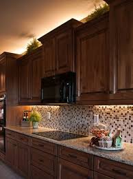 50 Beautiful Led Style Lighting Designs To Complement A New Apartment Diylightingtips Com L Light Kitchen Cabinets Above Kitchen Cabinets Kitchen Renovation