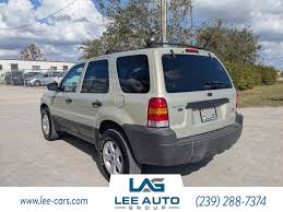 Image result for Gold Ash 2005 Escape