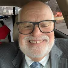 Malik J. Tuma, Co-Owner & Associate Broker