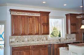 One contractor is quoting to install the tile flooring then install new kitchen cabinets on top, the second recommend installing cabinets first then lay the tile. Where To End Kitchen Backsplash Tiles Belk Tile
