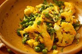 Pan Roasted Spiced Cauliflower With Peas Recipe Recipe Spiced Cauliflower Recipes Pea Recipes