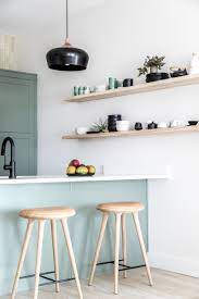 Tour A Portland Maine Home That Blends Scandinavian And Japanese Design Scandinavian Kitchen Design Light Green Kitchen Scandinavian Interior