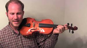 Gentle weight from the head, with a relaxed neck, stabilizes the violin on the collarbone. Beginner S Guide To Holding The Fiddle And Bow Youtube