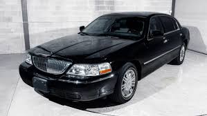 Image result for Light Ice Blue 2010 Town Car