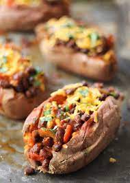 Vegetarian Black Bean Chili Stuffed Sweet Potatoes Recipe Sweet Potato Recipes Sweet Potato Vegetarian Recipes