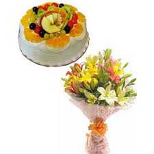Cake and flowers delivery in delhi. Mix Lilies Flowers And Half Kg Fruit Cake Delivery In Delhi And Ncr Online Cake And Flower Delivery In Ncr Best Cake Delivery In Noida Ghaziabad Send Cake To Noida24 Hours Cake