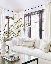 A 1920s Spanish Style Bungalow Gets A 120k Makeover Step Inside Living Room Decor Neutral Minimalist Living Room Decor Minimalist Living Room