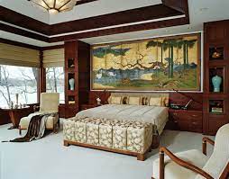 The high wooden shed ceiling that has exposed wooden beams match with the bedside drawers of the large bed that is on a light gray area rug over the beige carpeted flooring. 20 Chinese Home Decoration In The Bedroom Home Design Lover