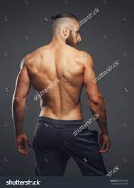 October 28, 2020 reading time: Muscular Man S Back On A Grey Background Male Pose Reference Human Poses Reference Man Anatomy