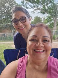 Sisters wearing Chic Poppy Boutique earrings