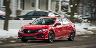 Thumbing the standard sport button not only conjures up more aggressive throttle and power steering response, it firms the shocks for improved handling. 2017 Honda Civic Hatchback 1 5t Manual Test Review Car And Driver