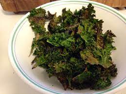 Best Baked Healthy Kale Chips Bunch Of Baby Kale Wash It Sprinkle Some Olive Oil Salt Lemon And Black Pa Healthy Kale Chips Healthy Baking Kale Chips