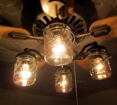 I like that it looks rustic yet elegant. Rustic Mason Jar Ceiling Fan Light Kit Only With Vintage Pints Etsy Ceiling Fan Light Kit Ceiling Fan With Light Mason Jar Light Fixture