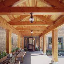 The most common characteristics of a craftsman style house include: Exposed Truss Porch Ideas Photos Houzz