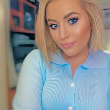 This always gets me, to see my reflection in the single windowpane that  remained intact from the 40,000 windows in the Twin Towers. The windowpane  is from the 82nd floor of the