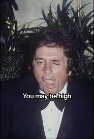 Johnny Cash Eating A Birthday Cake in A Bush