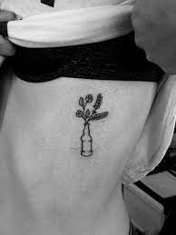 Small Flower Rib Cage Tattoo Stick And Poke Tattoo Made By Catherine Henault Pin Point Ribcage Tattoo Poke Tattoo Tattoos