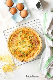 Classic Quiche Lorraine A Cheesy Bacon Quiche Is Easy To Make And Great For Any Meal Quiche Lorraine Recipe Quiche Recipes Easy Breakfast Recipes Casserole