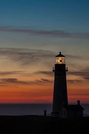 Yaquina Head Lighthouse At Night Oregon Lighthouse Lighthouse Keeper Sunset