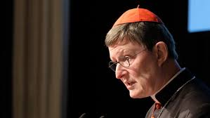 Erzbischof rainer maria kardinal woelki sprüht mit kreide den schriftzug #gutmensch auf den boden. Kardinal Woelki Wurdigt Einsatz Fur Gefahrdetes Leben Evangelisch De