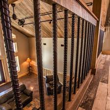 Porch railing ideas with rebar. Custom Finishings Like This Attractive Rebar Railing Is What Help Turn Each Of Our Projects Into A Unique Legacy Rustic Stairs Rustic Staircase Loft Railing