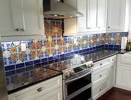 Tiling a backsplash is much easier than you think, we promise! Spice Up Your Kitchen Add A Splash Of Color To Your Kitchen Backsplash With Our Talavera Tiles Mexican Style Kitchens Kitchen Interior Kitchen Design Board
