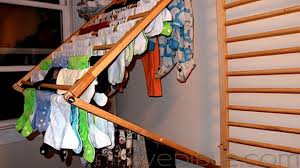 Plus, the rack folds flat against the wall so it's out of the way when not in use. Diy Wall Mounted Folding Clothes Dryer Rack