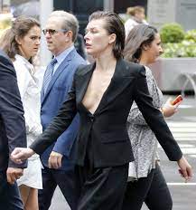 Milla Jovovich Nip Slip (5 Photos) | #TheFappening