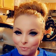 Who is a good tattoo artist for a USMC emblem?