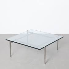 The table top is made of solid wood in the following f Pk61 Couchtisch Poul Kjaerholm Fritz Hansen Neef Louis Design Amsterdam