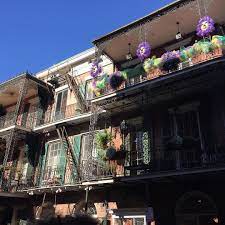 Beautiful New Orleans With A Little Bit Of Mardi Gras Decorations On The Right Balcony Frenchquarter Nofilter Trave Mardi Gras Decorations Mardi Gras House Styles