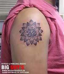 Many even know it because of the fact that it is the first sound in the universe. Big Guys Tattoo Om Tattoo With Lotus Flower On Arm Is Available At