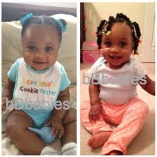 Adorable Chignons And Two Strand Twist Highlighted By Adorable Barrettes On The Ends Baby Girl Hair Beautiful Black Babies Baby Girl Fashion