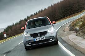 Maybe you would like to learn more about one of these? Porsche 911 Turbo S Vs Smart Fortwo A Real World Race Across Wales Autocar