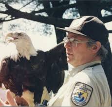 Maurry Mills teaching with Bart the bald eagle